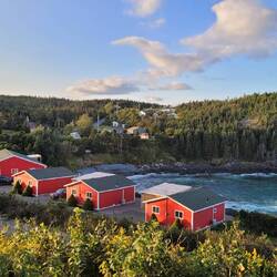A view of the Retreat property from their RV area. The red cottages are cute, but too big for us.