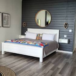 Our room at Cliff's Edge Retreat is modern, main flr, with a private deck overlooking the ocean