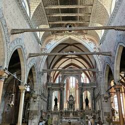Interior of church. Extensive detaiiled decorations on ceiling and walls