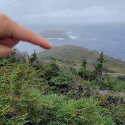 Hardest hike: the Sleepy Cove trail at Crow's Head, Twillingate. I'm pointing at our destination.