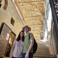 Laura and Chad with Renaissance ceiling of indoor market