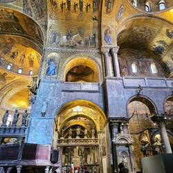 Golden glow throughout from gold mosaics