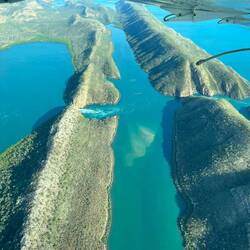 The falls from the side, the middle lake is enclosed so the water gets forced all the way through