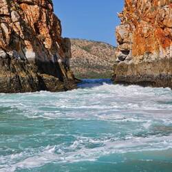 Up close to the thin gap, that is a 2.5 m wall of water dropping into it