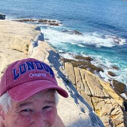 Sitting on a cliff, whale watching