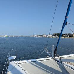 The anchorage between the island and the town.