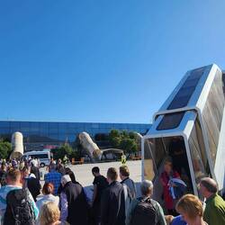 Funny queue after deplaning, before we all marched 100m beside the building allowed inside.