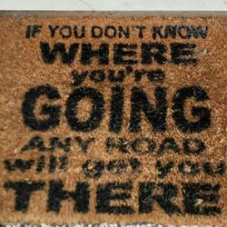 The floor below us. Perhaps our motorcycle trip slogan?