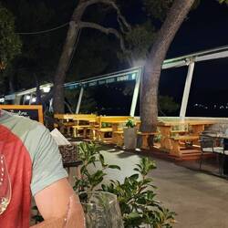 Ocean front dining with warm breezes on a moon lit night