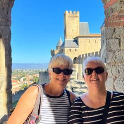 Brigitte & Danielle with part of the Château Comtal in the background