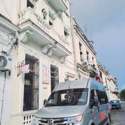 mini tour bus to take us all around Cuba .