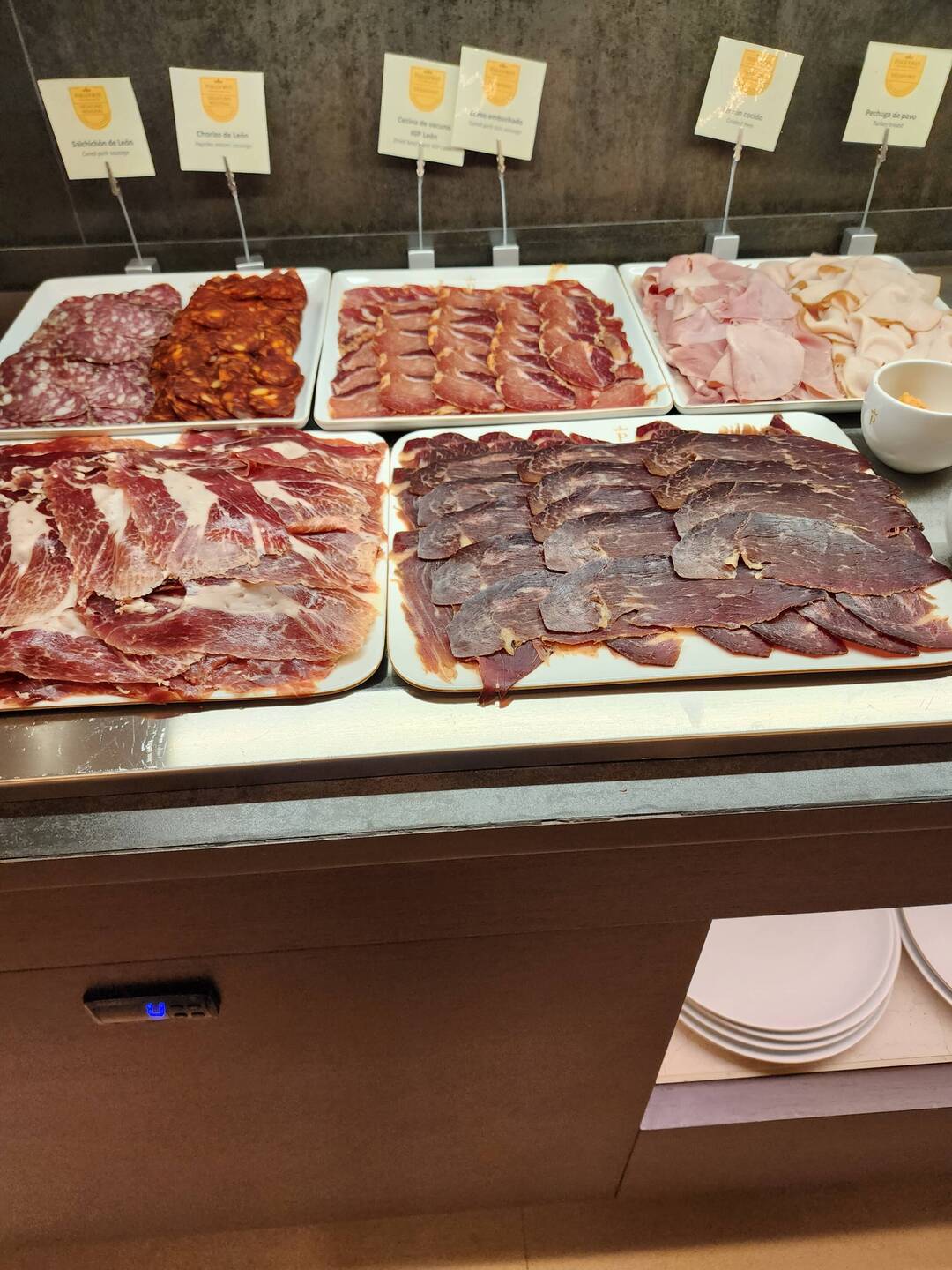 The selection of cured meats at breakfast.