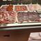 The selection of cured meats at breakfast.