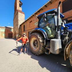 Pat looks tiny next to the tractor tires.
