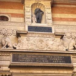 Renaissance portal in the courtyard, features a statue of King Henry IV