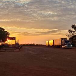 Road train sunset