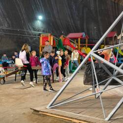 School kids playing on equipment