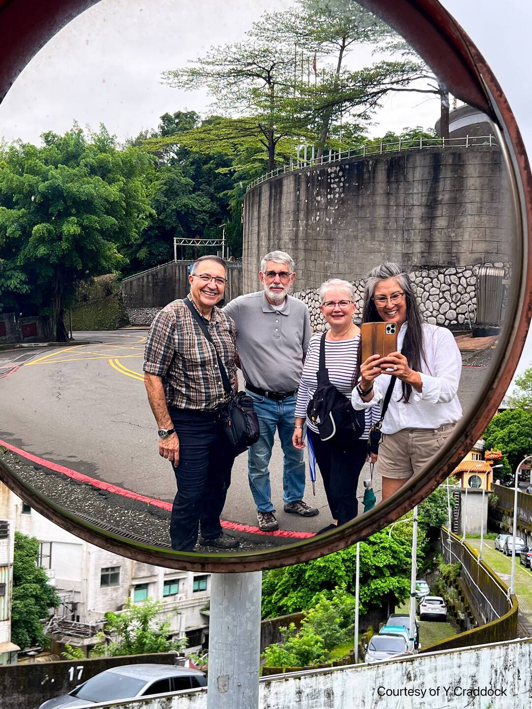 Younga finds an interesting selfie-op on the way down from the Big Buddha Temple — Keelung, Taiwan.