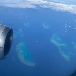 Beginnings of the Great Barrier Reef from the plane.