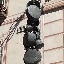 Large pots hanging in the street