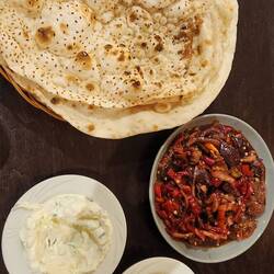 Restaurant Nour. Amazing fresh bread, dips and roasted pepper salad