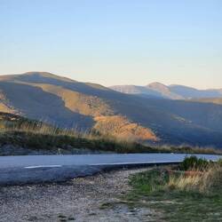 Sun coming up over the peak
