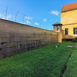 Names of victims who died are etched on these walls
