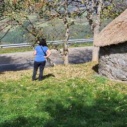 Pretty wife next to funky house
