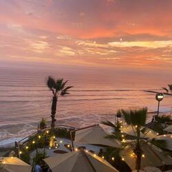 Sipping pisco sours and watching our final Peruvian sunset