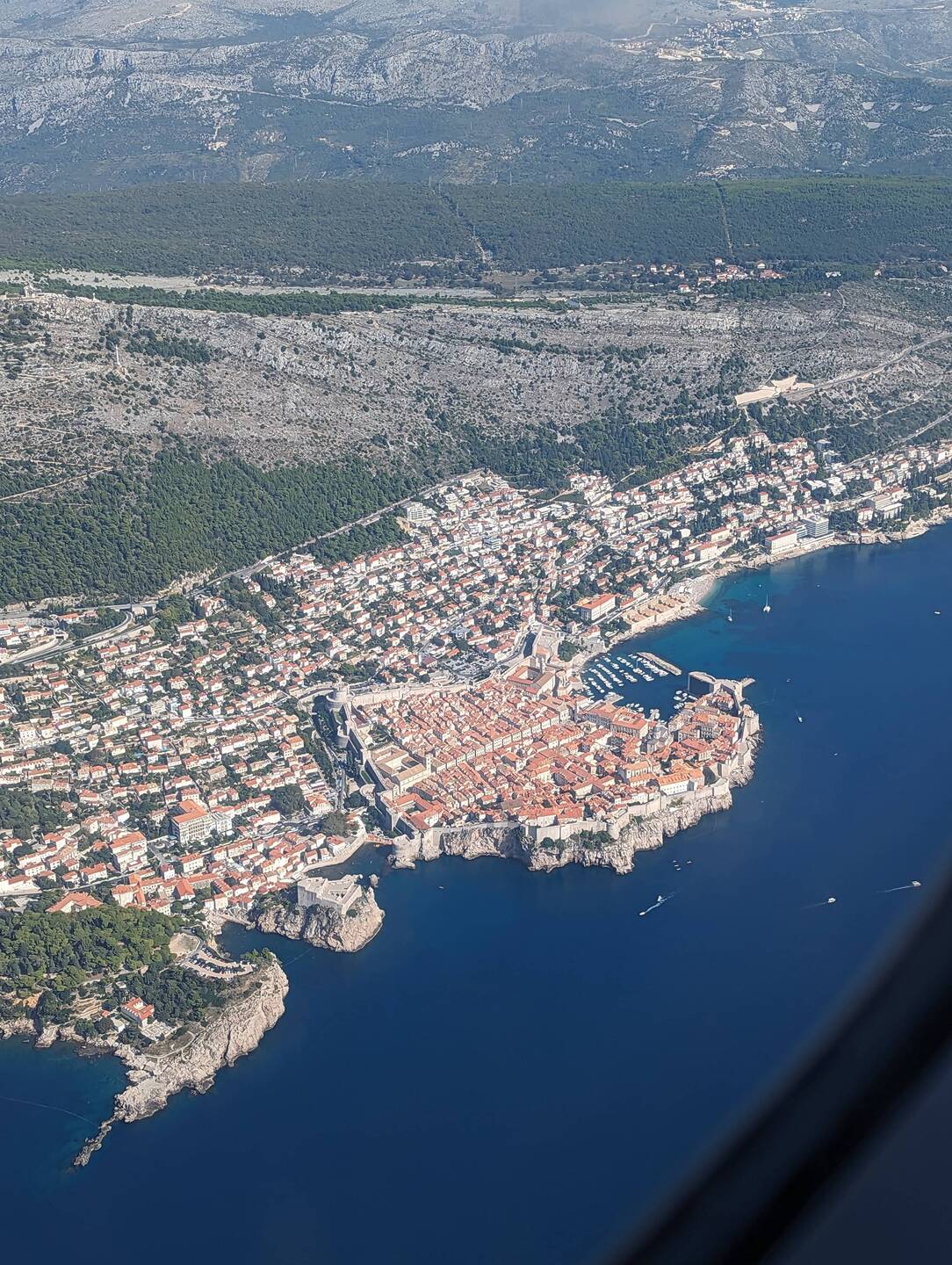 View of old town Dubrovnik flying in to the airport along the cost