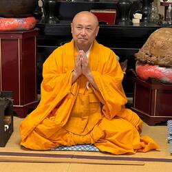 Buddhist Monk Leads in Meditation