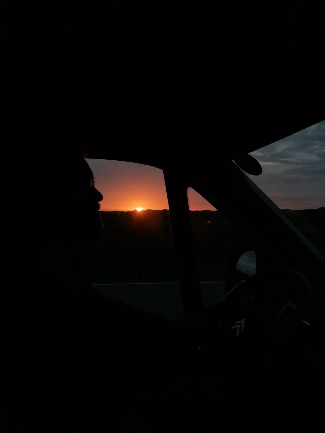 Sonnenuntergang während der Fahrt