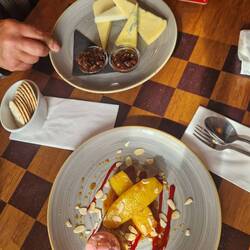 Local cheeses, including goat cheese and pineapple cooked in rum 😋