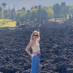 Mount Etna lava flow with the summit crater in the background