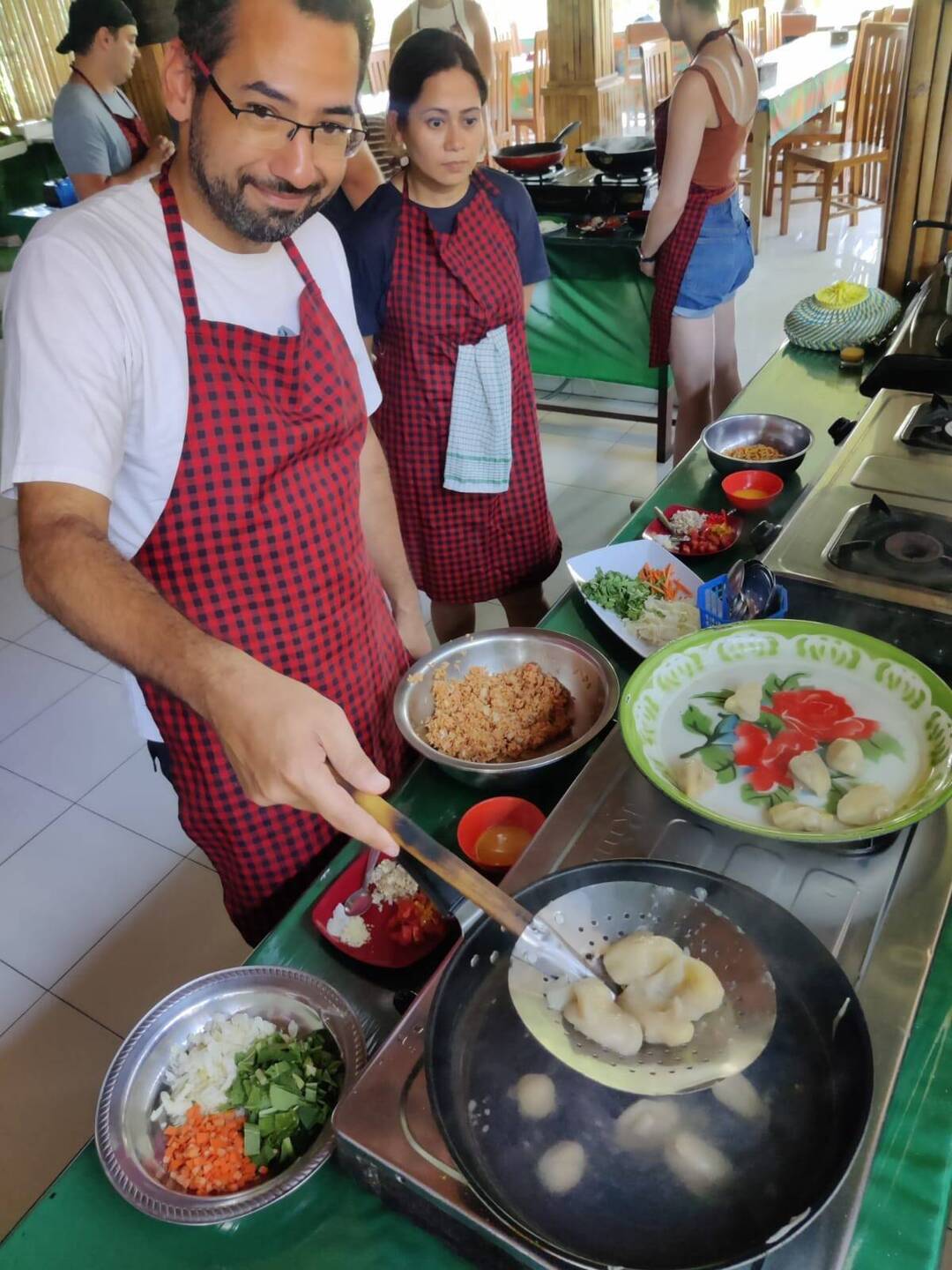 Me preparing the banana dumplings in our Balinese cooking class