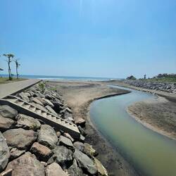 Water from a river is flowing into the Indian Ocean