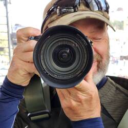 Took a sky tram and Gina snapped a pic of me shooting the skyline