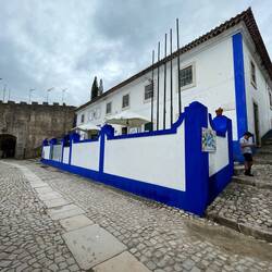 Several buildings have a painted trim of bright blue