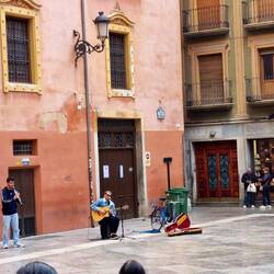 This is the saxaphone player and the busker