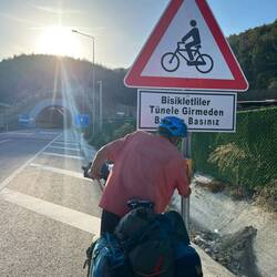 Press the button to warn motorists there are 2 cyclists in the tunnel ahead