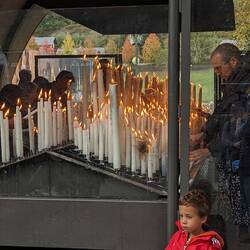 Tables of lit candles