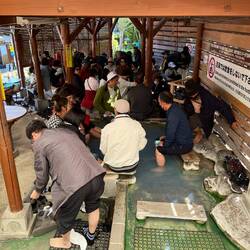 Crowded foot bath with Chinese groups