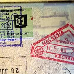 My entry and exit stamps for my transit at KUL.
