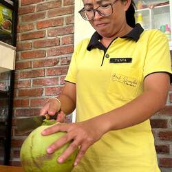 Astonishinging that Balinese still have all fingers after opening so many coconuts