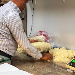 Shopping in Bergama, we stand in the pastry shop admiring the preparation of shredded dough