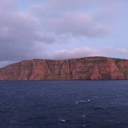 Looks a bit like Ayers Rock in setting sun