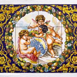 Tile panel on a house in Ronda, Spain.