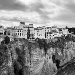 Cityscape across the gorge ... in B&W — Ronda, Spain.