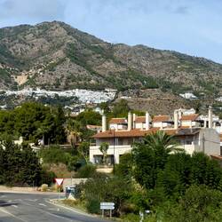 We're heading up to Mijas, the white village in the foothills.