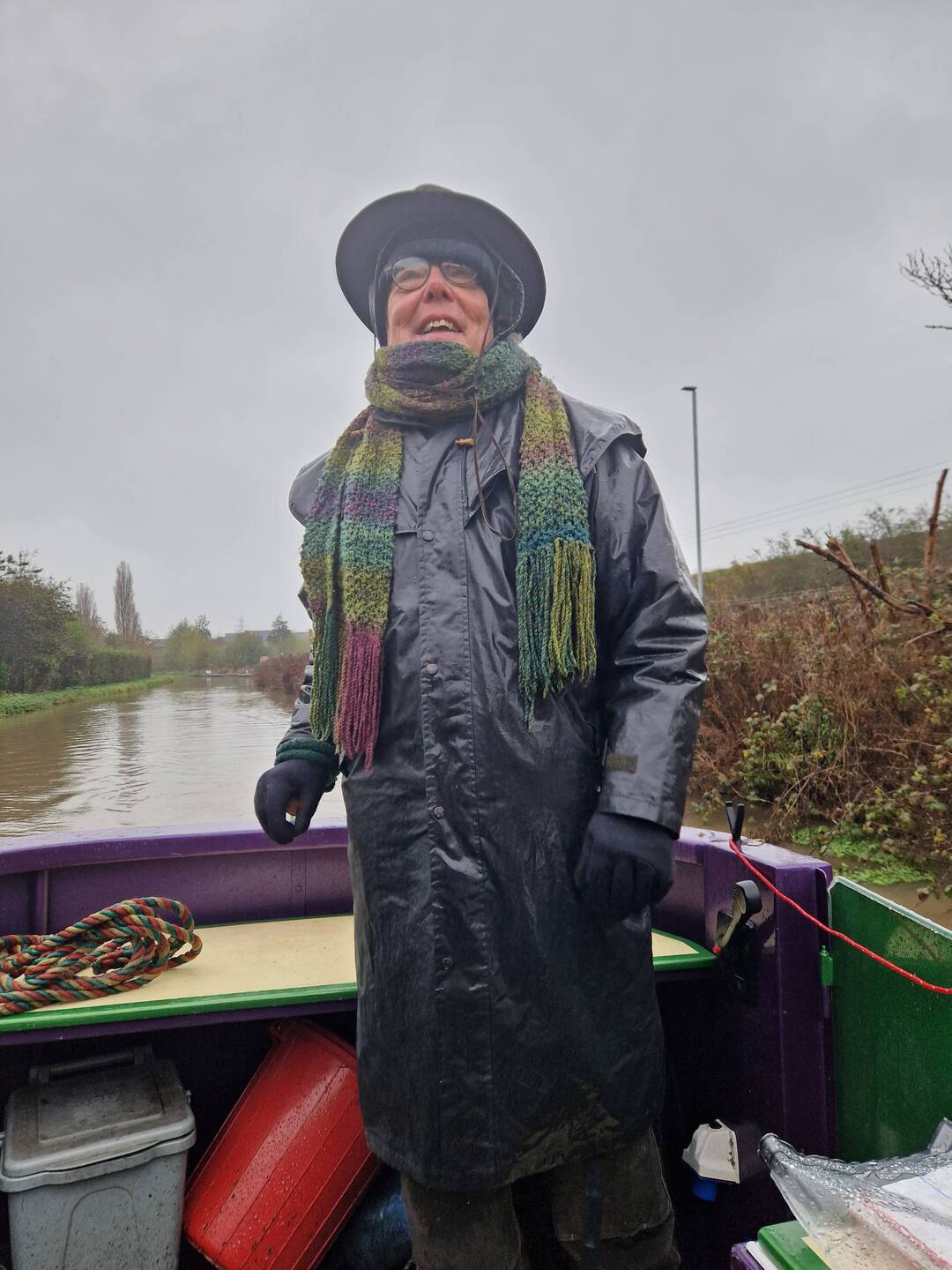 A very soggy Will at the tiller